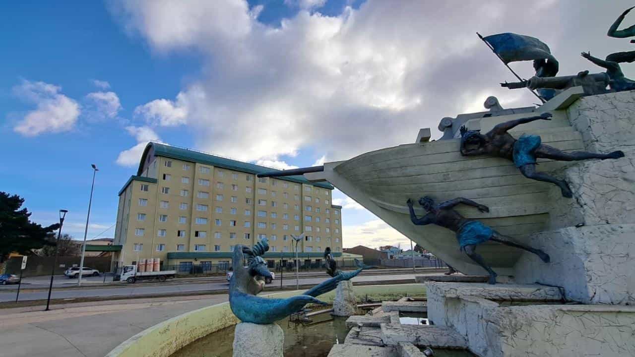 Statue of figures climbing a ship next to Hotel Diego de Almagro Punta Arenas.